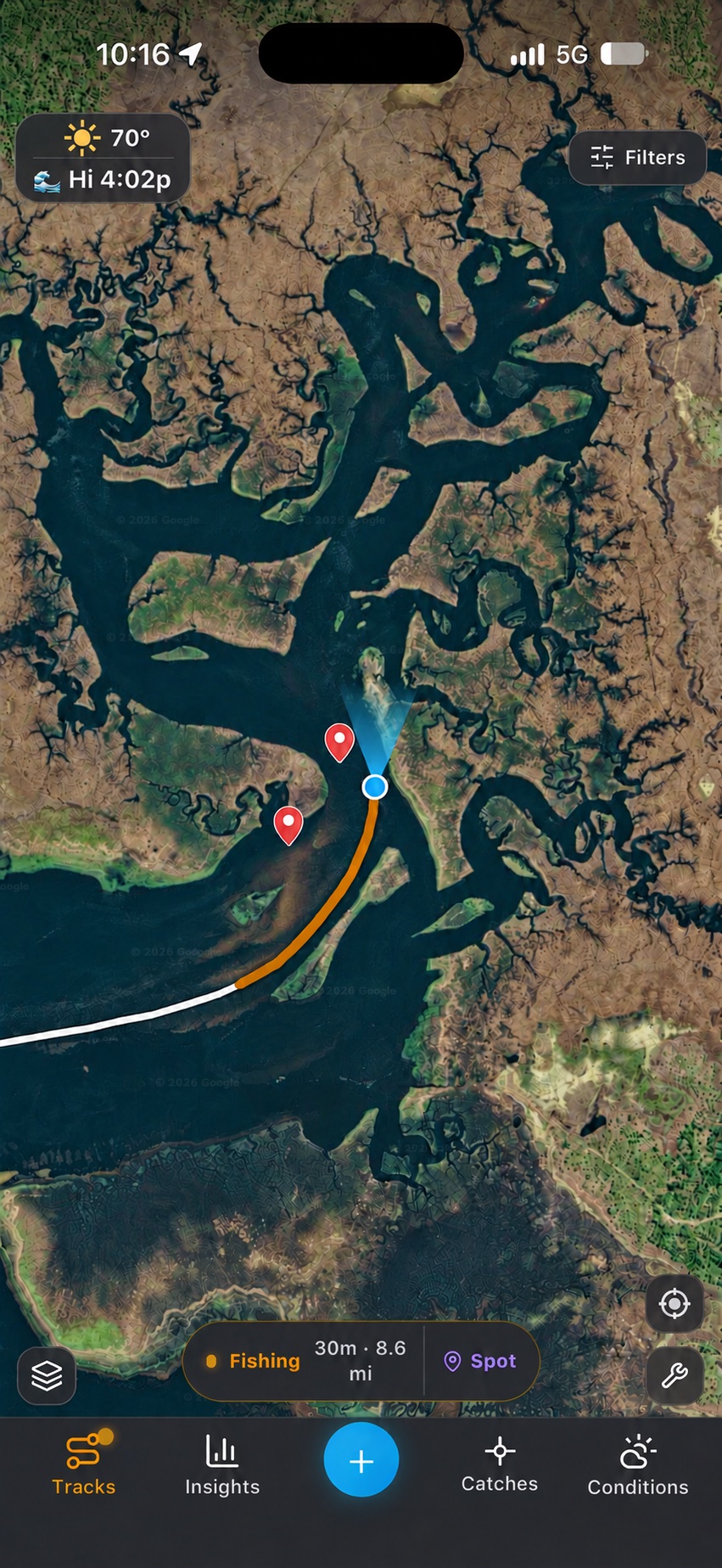Recorded fishing trip on a satellite map with a route, saved spots, elapsed time, and distance